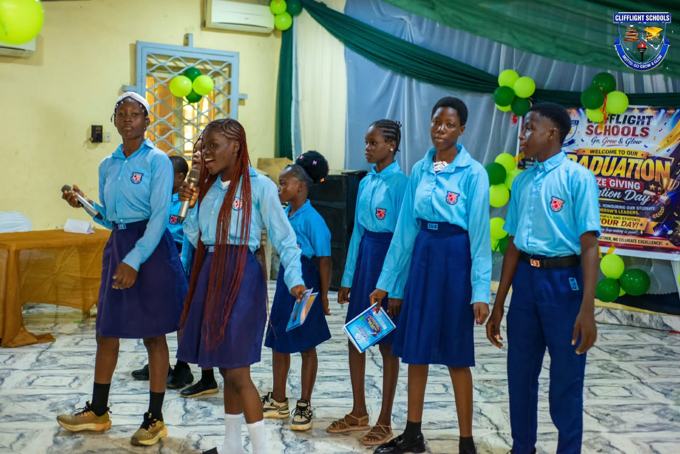 Clifflight college students performing at graduation